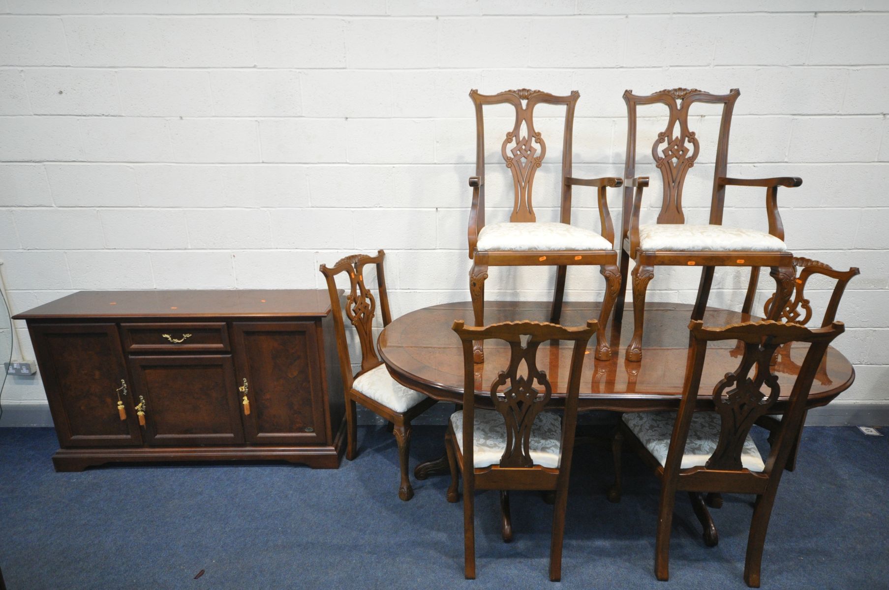 A REPRODUCTION MAHOGANY AND BURR WOOD DINING TABLE, on a twin pedestal base, all labelled Novalinea,