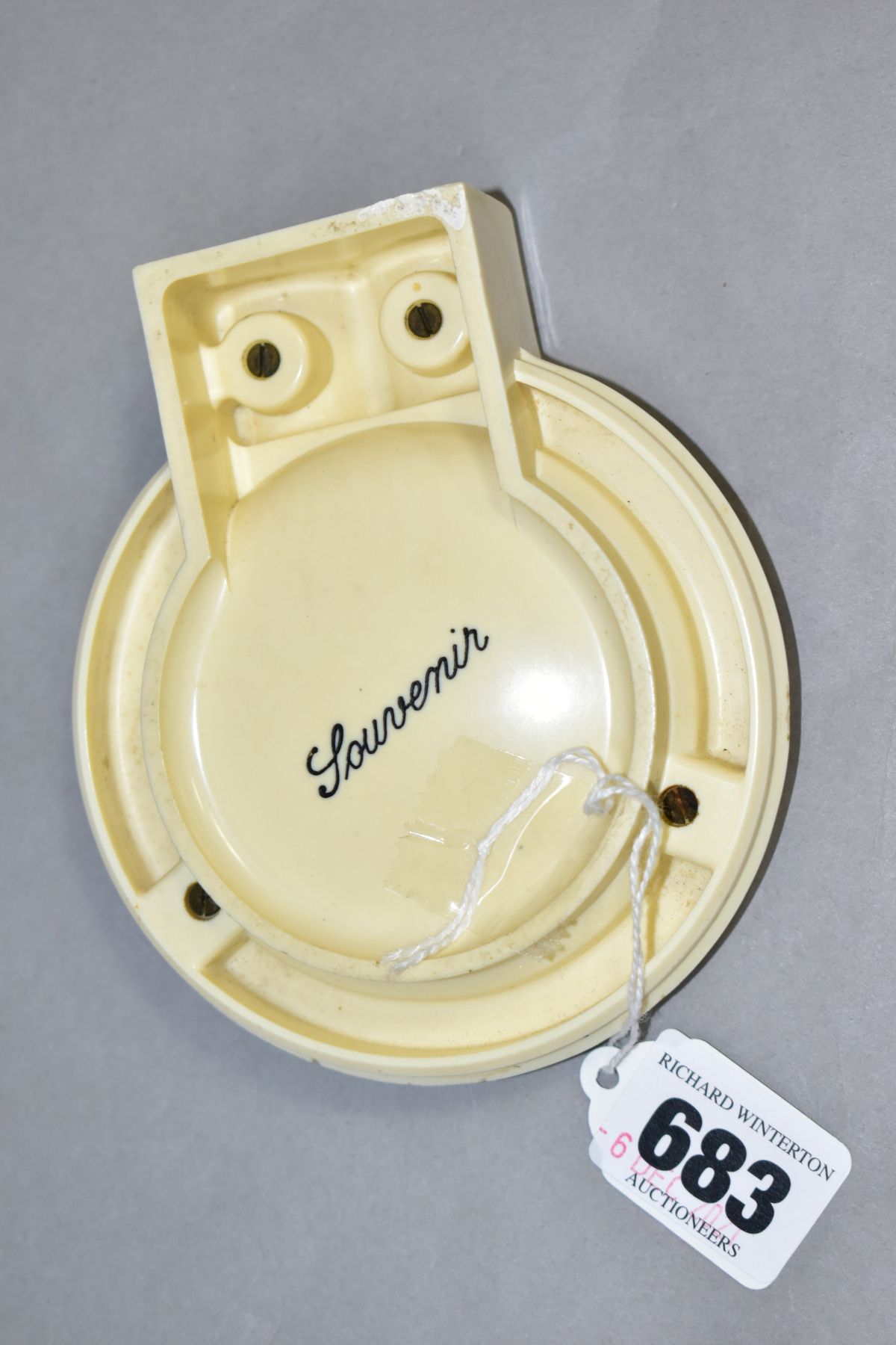 AN ART DECO BAKELITE RMS QUEEN MARY ASHTRAY, in cream and black, with RMS Queen Mary marked on one - Image 4 of 5