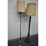 AN EARLY 20TH CENTURY ARTS AND CRAFTS STANDARD LAMP, with a thin octagonal upright and a shade,