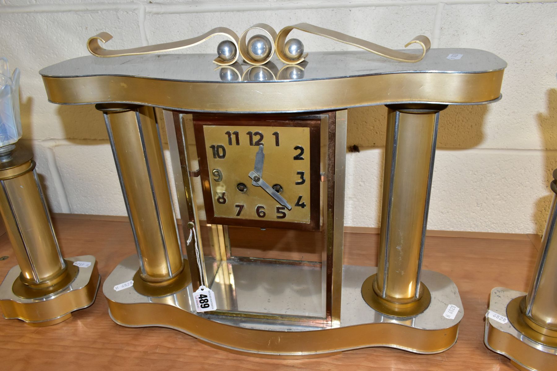 AN ART DECO STYLE CLOCK GARNITURE, the gold coloured metal case with chromed details, Arabic - Image 5 of 10