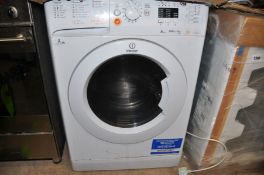 AN INDESIT INNEX XWDA751480 WASHER DRYER and a Sanyo microwave (both PAT pass and working) (2)