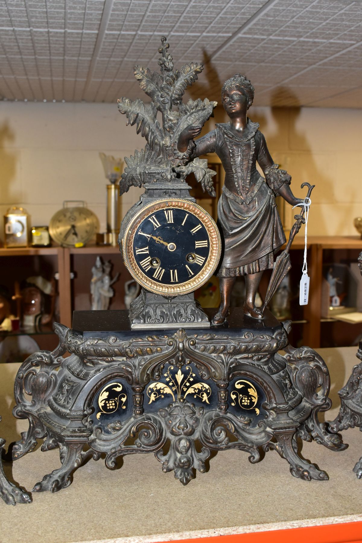 A LATE 19TH CENTURY BRONZED SPELTER AND BLACK SLATE CLOCK GARNITURE, the mantel clock with figure of - Image 5 of 14