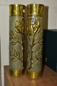 A PAIR OF EARLY 20TH CENTURY BRASS TRENCH ART VASES MADE FROM SHELL CASES, each embossed with a