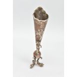 A SILVER DECORATIVE POSY VASE, tapered design, embossed with a rubbed woodland scene with a lady and