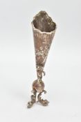 A SILVER DECORATIVE POSY VASE, tapered design, embossed with a rubbed woodland scene with a lady and