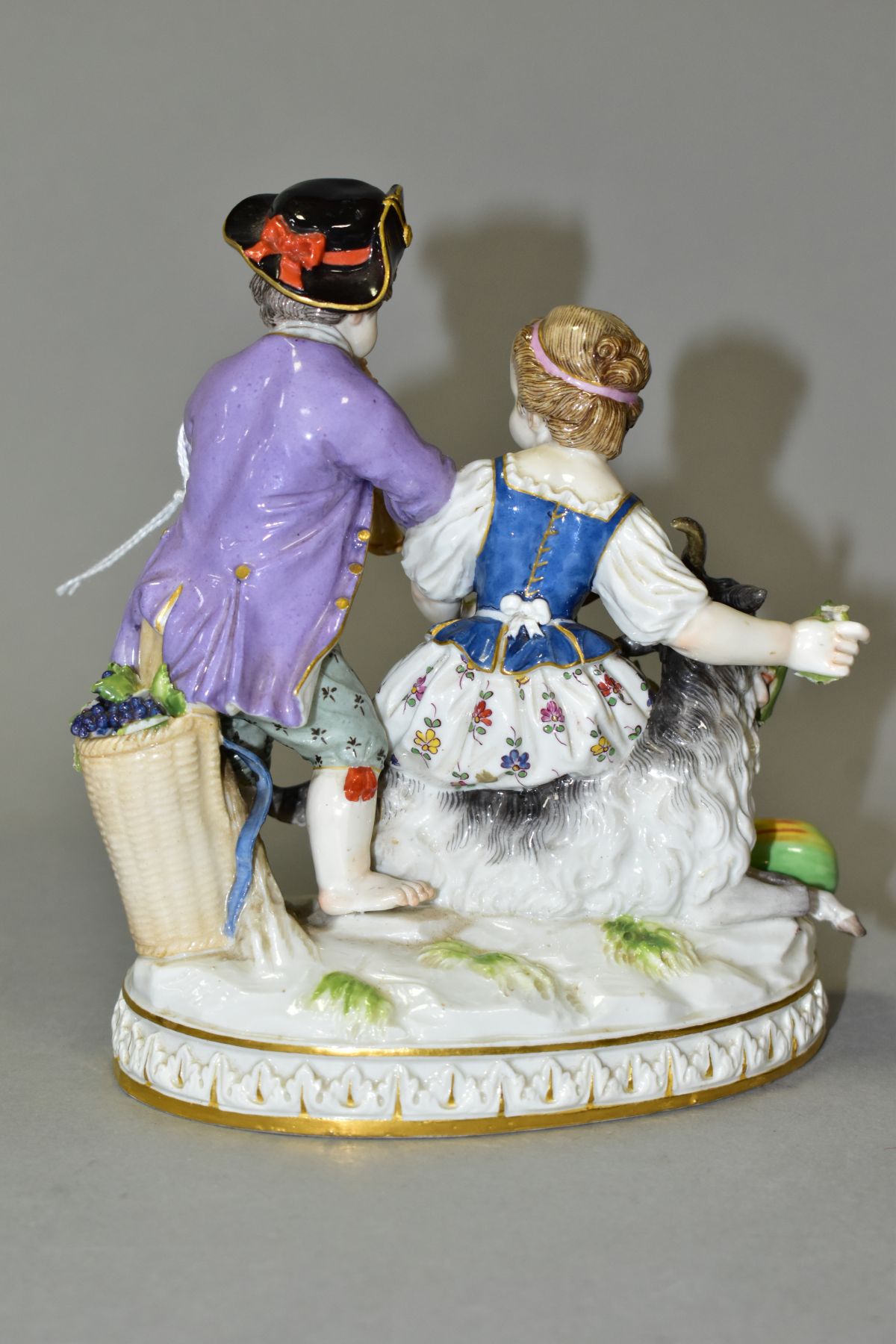 A LATE 19TH CENTURY MEISSEN FIGURE GROUP OF A BOY AND A GIRL WITH A GOAT, the boy playing a wind - Image 3 of 11