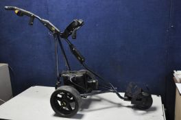 A POWAKADDY battery powered golf caddy (PAT fail not powering up) along with another manual