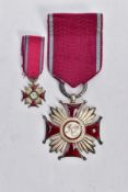 A PAIR OF ENAMELED POLISH ORDER OF MERIT MEDALS, two medals with enamel detailing and the letters