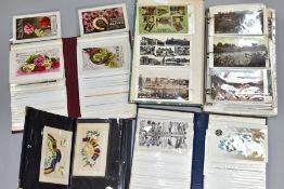 POSTCARDS, approximately 455 Postcards in four albums featuring early - mid 20th century