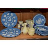 A COLLECTION OF BOXED WEDGWOOD JASPERWARE IN PALE BLUE ANF PRIMROSE YELLOW, comprising eight