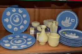 A COLLECTION OF BOXED WEDGWOOD JASPERWARE IN PALE BLUE ANF PRIMROSE YELLOW, comprising eight