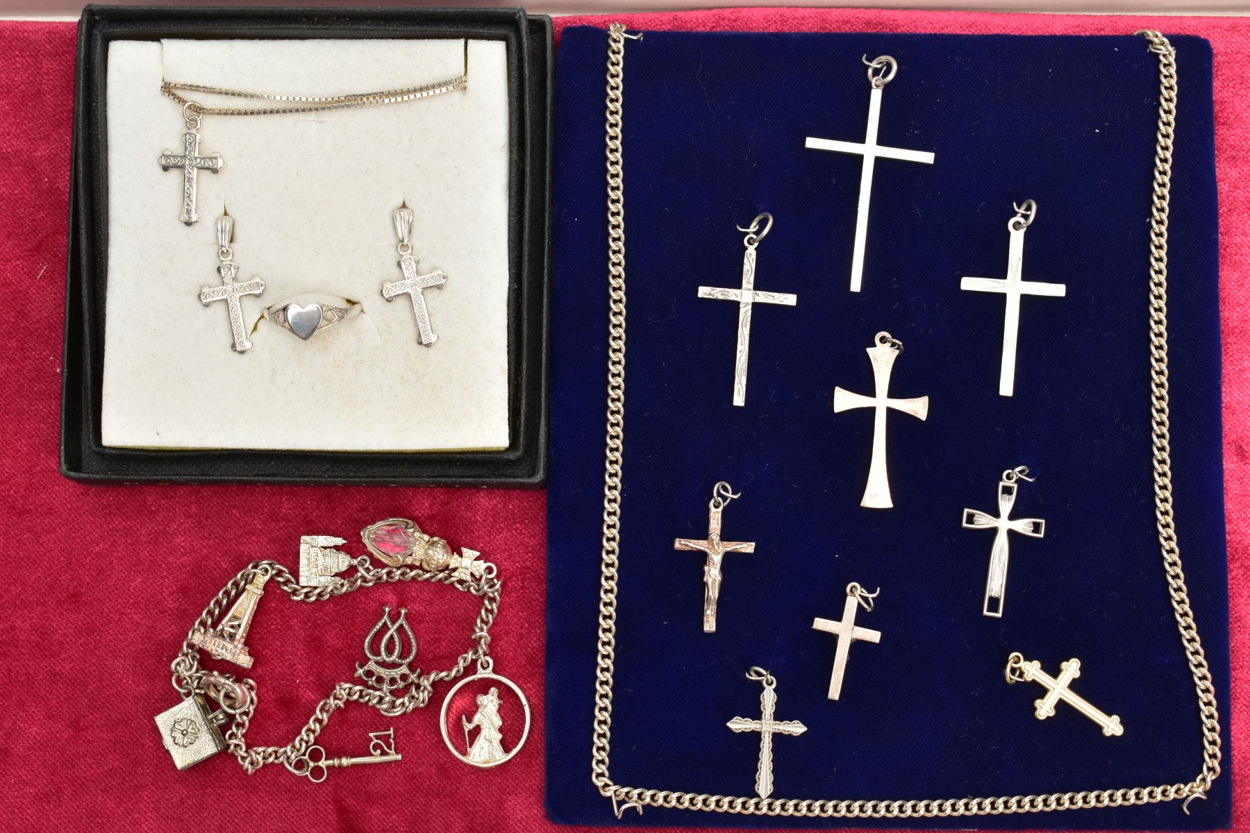 A SELECTION OF SILVER AND WHITE METAL PENDANTS, CHAINS AND RING, to include nine cross pendants of