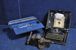 A VINTAGE HANDY MODEL G.2 BENCH VICE with a metal toolbox containing a handful of spanners and a