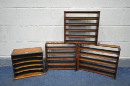 AN OAK DESK ORGANISER, and three teak collector wall shelves (4)