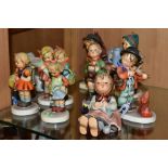 A COLLECTION OF EIGHT HUMMEL FIGURES, comprising 'Puppy Love', 'Happy Pastime', 'Little