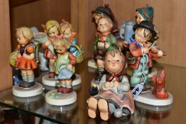 A COLLECTION OF EIGHT HUMMEL FIGURES, comprising 'Puppy Love', 'Happy Pastime', 'Little