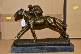 A BOXED REPRODUCTION BRONZE OF A RACEHORSE AND JOCKEY on a marble style plinth, approximately 21cm x