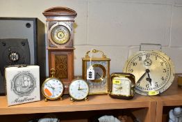 A GROUP OF SIX VARIOUS CLOCKS, comprising a late 19th century miniature longcase clock, height 27.