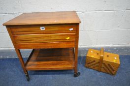 A MID CENTURY TEAK SEWING TROLLEY, and a beech cantilever sewing box (2)