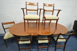 A YEW WOOD TWIN PEDESAL DINING TABLE, with one additional leaf, extended length 216cm x closed