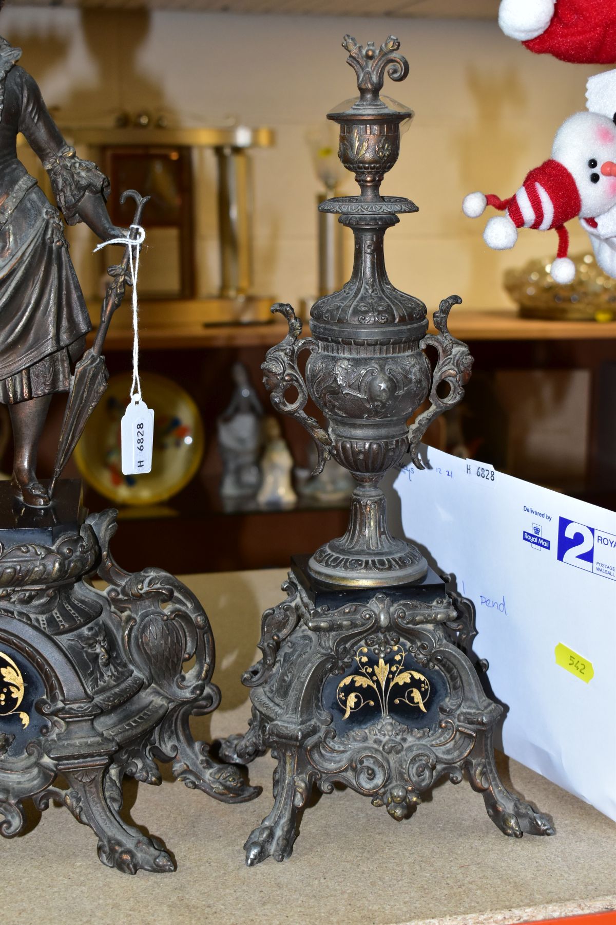 A LATE 19TH CENTURY BRONZED SPELTER AND BLACK SLATE CLOCK GARNITURE, the mantel clock with figure of - Image 2 of 14