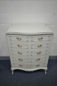 AN OLYMPUS CREAM FRENCH CHEST OF FIVE DRAWERS, width 92cm x depth 55cm x height 108cm (glass top)