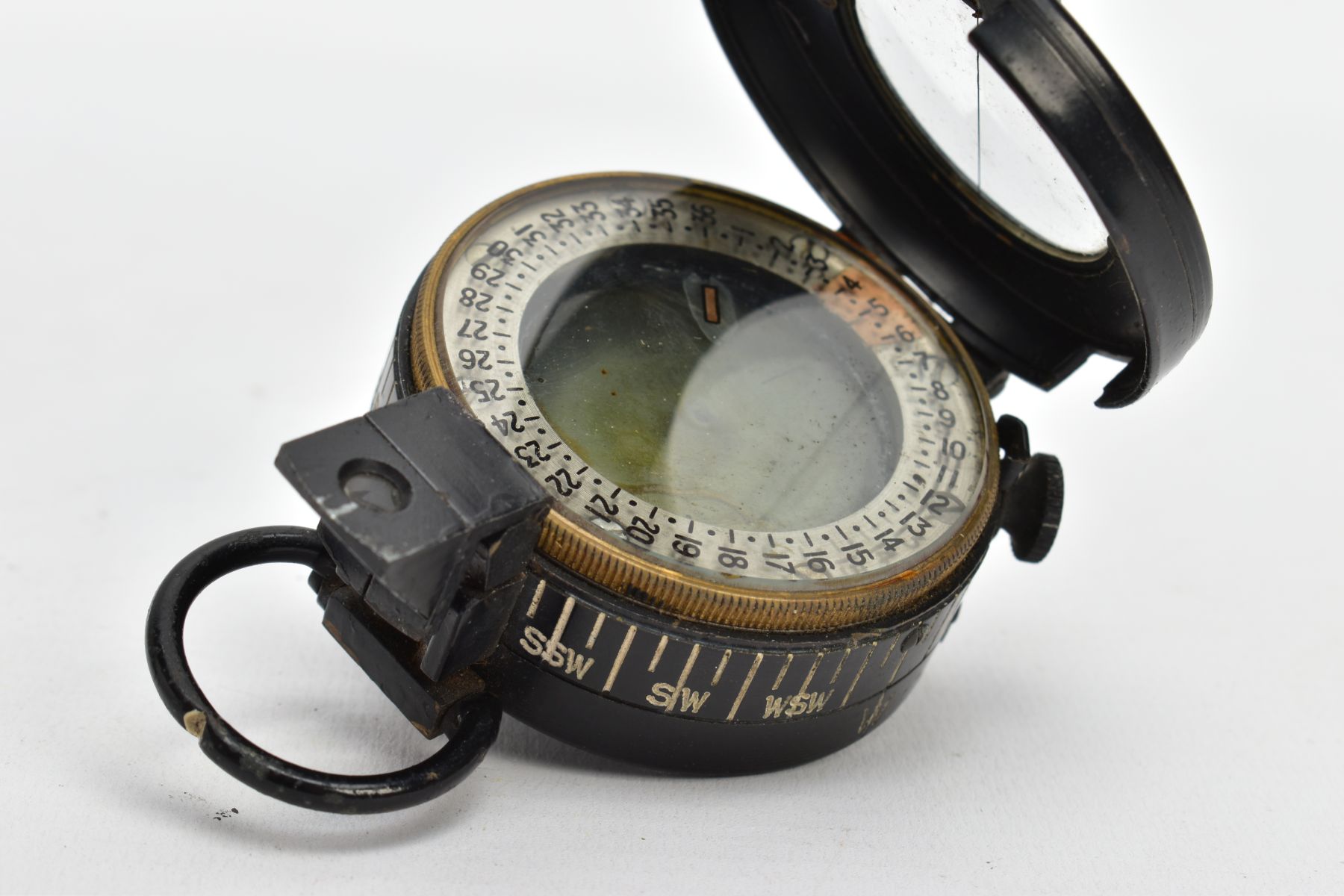 A MILITARY COMPASS, black compass, stamped T.G.C2 Ltd London number 234303, dated 1943 MK III - Image 7 of 7