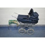 A 20TH CENTURY NAVY BLUE SILVERCROSS PRAM together with an extra hood (2)