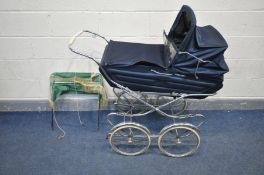 A 20TH CENTURY NAVY BLUE SILVERCROSS PRAM together with an extra hood (2)