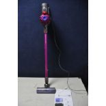 A DYSON TS1-UK-JEC1700A cordless vacuum with charger and instruction manual (PAT pass and working)