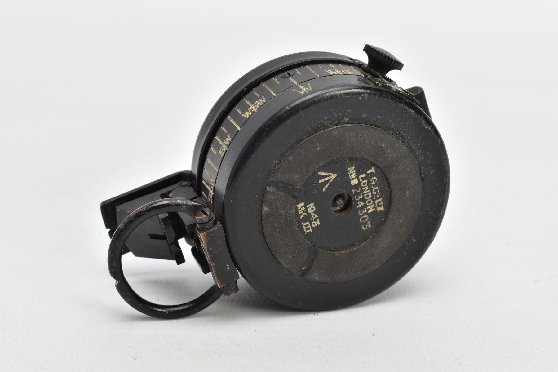 A MILITARY COMPASS, black compass, stamped T.G.C2 Ltd London number 234303, dated 1943 MK III - Image 6 of 7