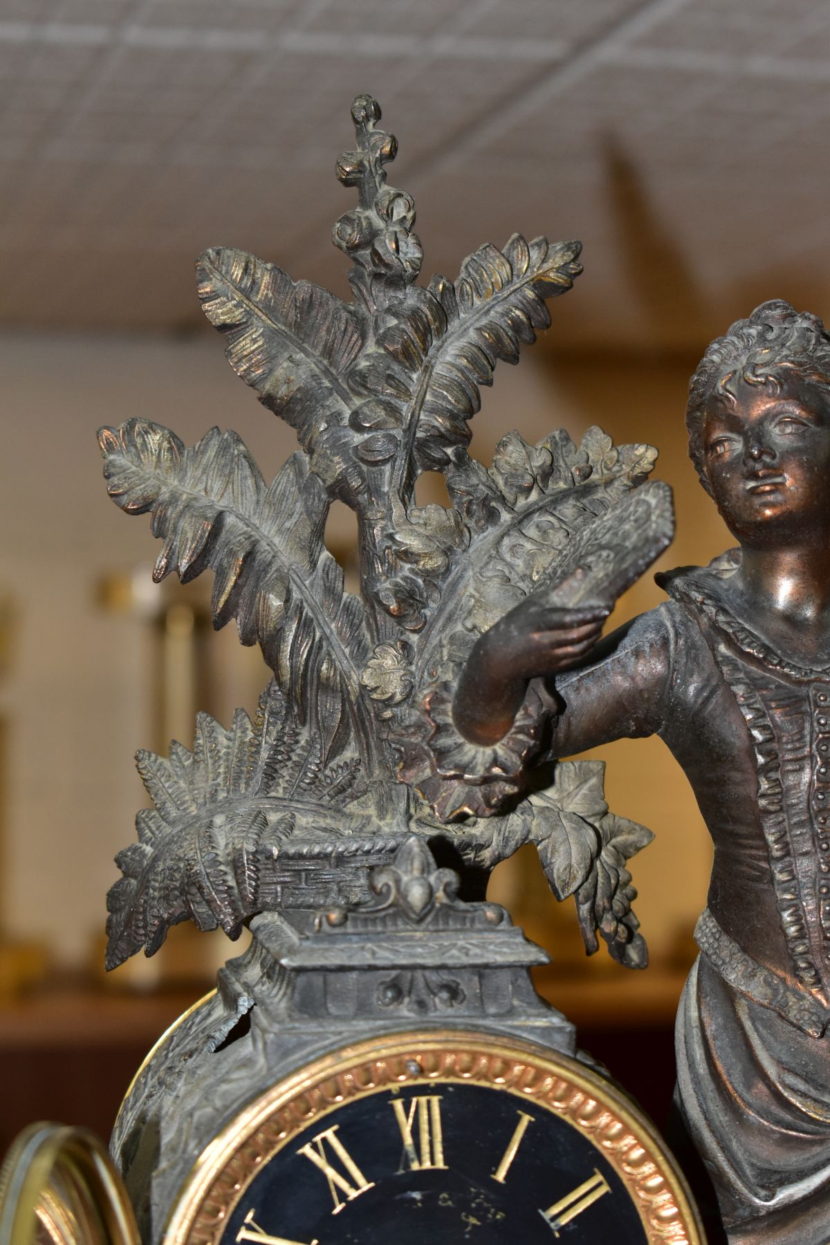 A LATE 19TH CENTURY BRONZED SPELTER AND BLACK SLATE CLOCK GARNITURE, the mantel clock with figure of - Image 8 of 14