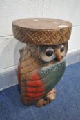 A CARVED HARDWOOD OWL STOOL