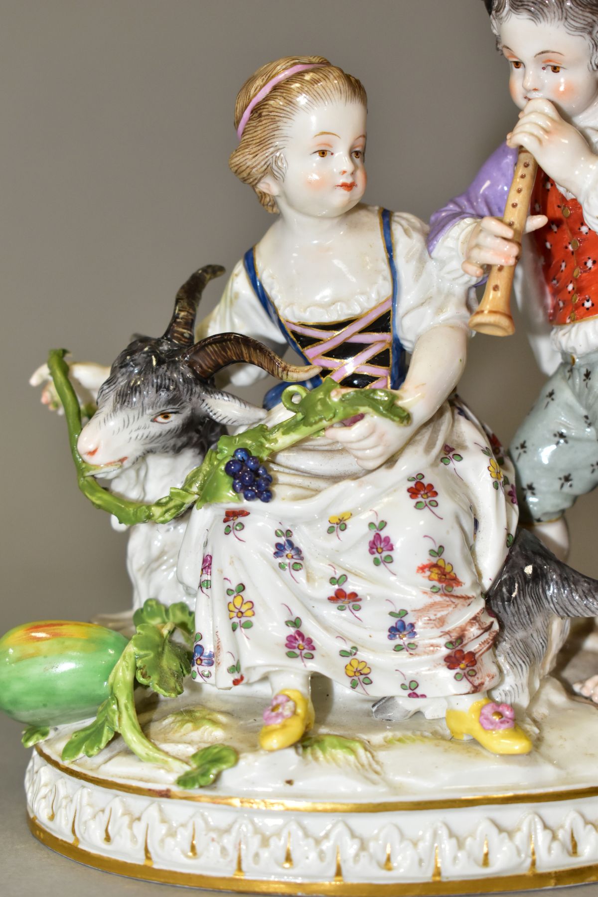 A LATE 19TH CENTURY MEISSEN FIGURE GROUP OF A BOY AND A GIRL WITH A GOAT, the boy playing a wind - Image 8 of 11