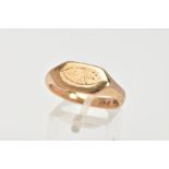 A 9CT GOLD GENTLEMENS SIGNET RING, the signet ring of a rectangular shape and a rubbed engraving, to