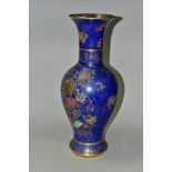 A CARLTON WARE CHINESE STYLE POWDER BLUE BALUSTER VASE, enamelled and gilded with birds and flowers,