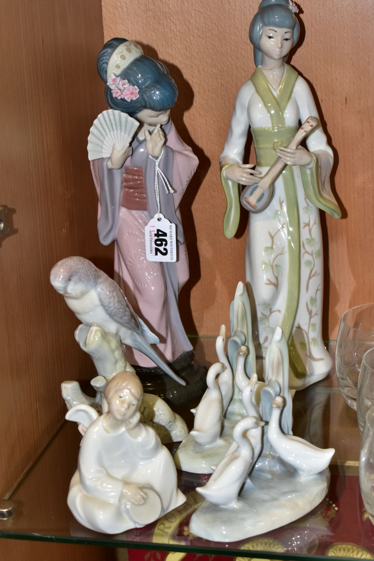 A GROUP OF LLADRO, NAO ETC, comprising Lladro Timid Japanese/Chrysanthemum Geisha no4990 designed by