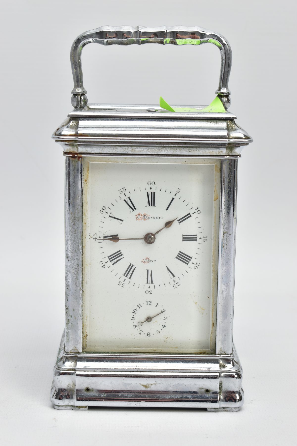 A FRENCH CARRIAGE CLOCK, featuring a white dial signed 'J.Bennett, Paris', Roman numerals, smaller