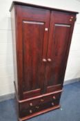 A STAINED PINE TWO DOOR WARDROBE with two drawers, width 90cm x depth 61cm x height 181cm (