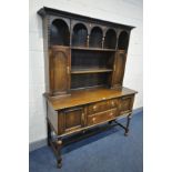 AN OAK DRESSER, with two drawers, turned bulbous front legs united by a H stretcher, width 153cm x