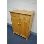 A SOLID OAK TWO DOOR CABINET, with two drawers, width 76cm x depth 46cm x height 106cm