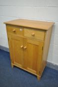 A SOLID OAK TWO DOOR CABINET, with two drawers, width 76cm x depth 46cm x height 106cm