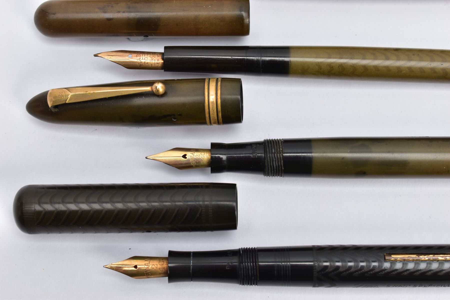 FIVE VINTAGE SWAN FOUNTAIN PENS BY MABIE TODD AND CO. comprising of a boxed black Leverless ( - Image 3 of 3