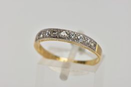 A YELLOW METAL DIAMOND HALF ETERNITY RING, designed with a row of nine round brilliant cut diamonds,