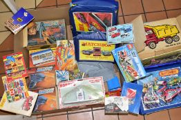 A BOX OF ACCESSORIES AND BOXES FOR DIE-CAST VEHICLES, to include two boxed Matchbox Big Mx Power
