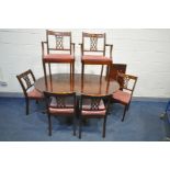 A MAHOGANY TWIN PEDESTAL DINING TABLE, six chairs including two carvers, along with a mahogany