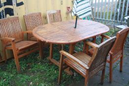 A TEAK OVAL EXTENDING GARDEN TABLE, open length 172cm x closed length 122cm x width 90cm x height