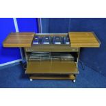 A PHILIPS HO100LB Philips hostess trolley with four Pyrex dishes with heated lids with all