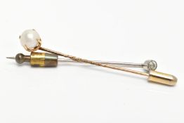 TWO EARLY 20TH CENTURY GEM SET STICK PINS, one white metal and diamond milgrain set stick pin,