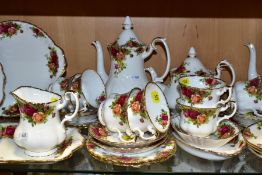 A COLLECTION OF ROYAL ALBERT OLD COUNTRY ROSES TEA AND COFFEE WARES, comprising a tea pot and cover,